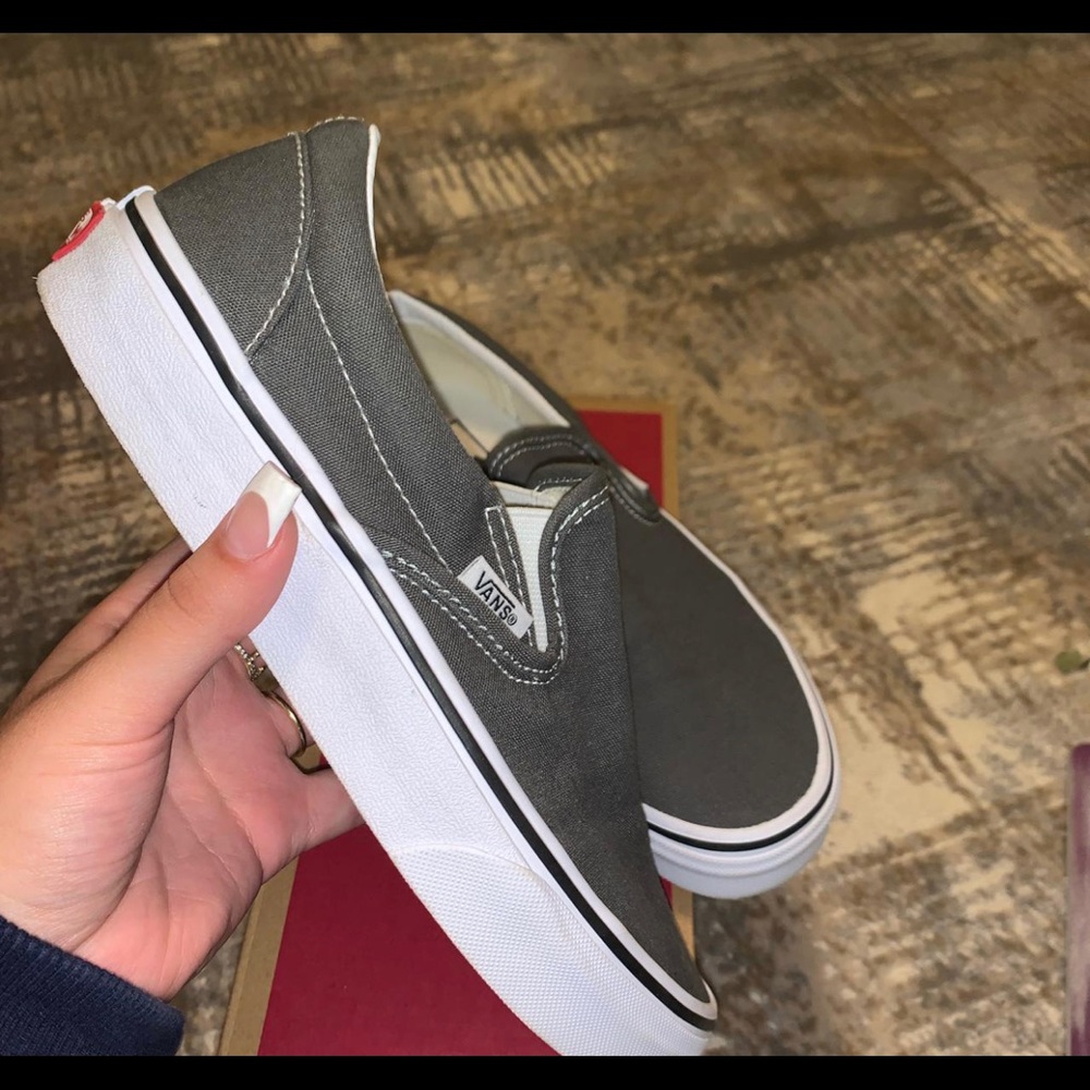 grey slip on vans.